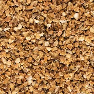 Revestimento de pedra natural Doce de Leite, grão grande, aplicado em parede